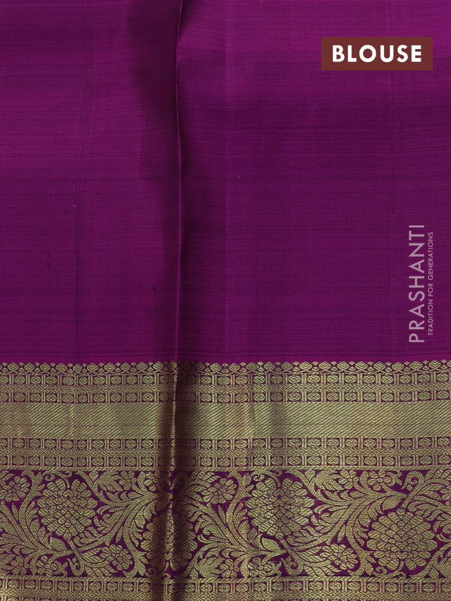 Pure kanjivaram silk saree dark green and purple with annam zari woven buttas and zari woven floral border butta style