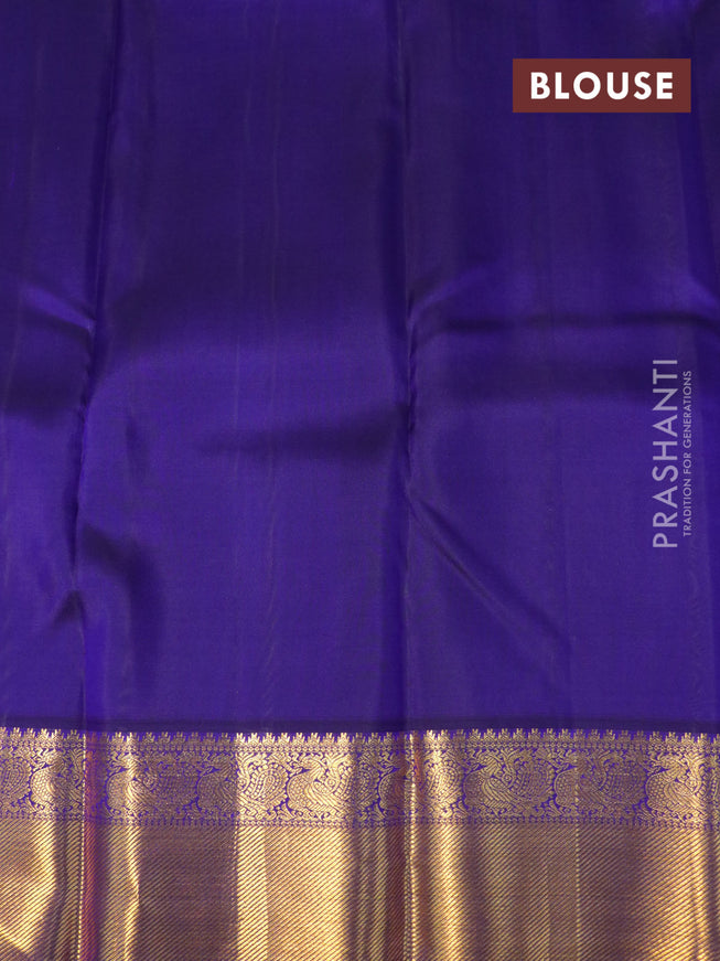 Pure kanjivaram silk saree pista green and dark blue with paisley zari woven buttas and rich annam zari woven border butta style
