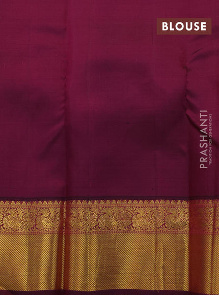 Pure kanjivaram silk saree teal green shade and dark magenta with paisley zari woven buttas and rich annam zari woven border butta style