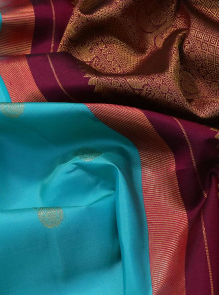 Pure kanjivaram silk saree teal blue shade and dark magenta with paisley zari woven buttas and rich annam zari woven border butta style