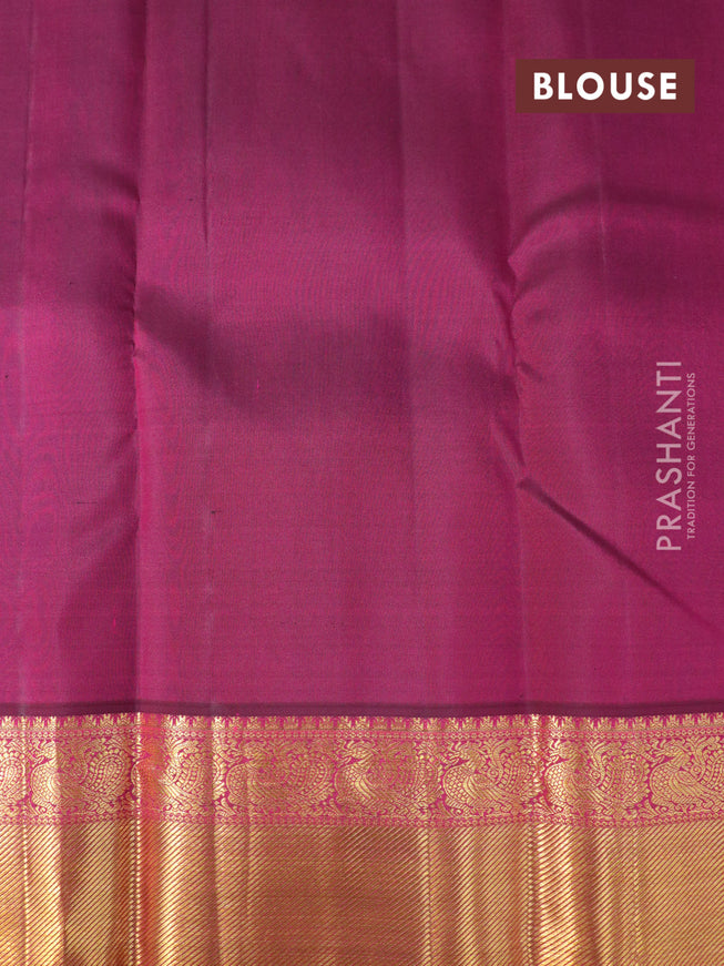 Pure kanjivaram silk saree teal blue shade and dark magenta with paisley zari woven buttas and rich annam zari woven border butta style
