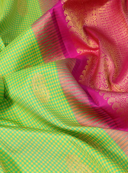 Pure kanjivaram silk saree green yellow and magenta pink with allover zari checked pattern & paisley zari buttas and rich zari woven korvai border checks