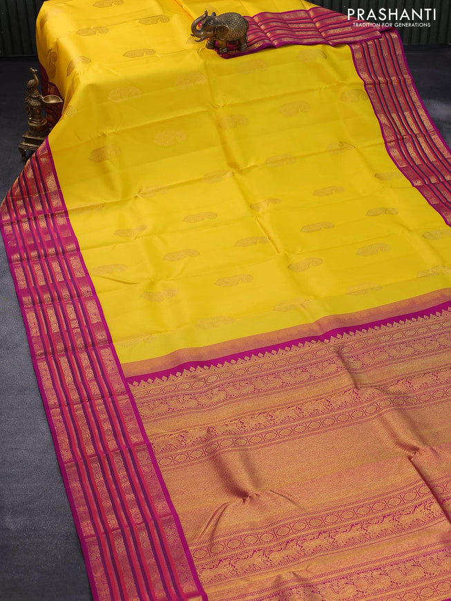 Pure kanjivaram silk saree mango yellow and purple with paisley zari woven buttas and rich annam & rudhraksha zari woven korvai border butta style