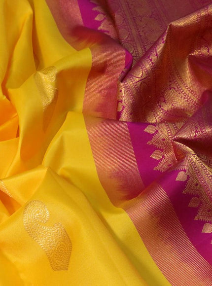 Pure kanjivaram silk saree mango yellow and purple with paisley zari woven buttas and rich annam & rudhraksha zari woven korvai border butta style