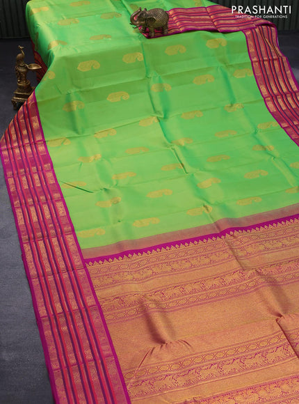 Pure kanjivaram silk saree light green and magenta pink with paisley zari woven buttas and rich annam & rudhraksha zari woven korvai border butta style