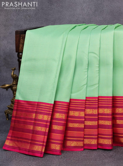 Pure kanjivaram silk saree teal green shade and pink with allover zari weaves and long rich zari woven border allover weaves