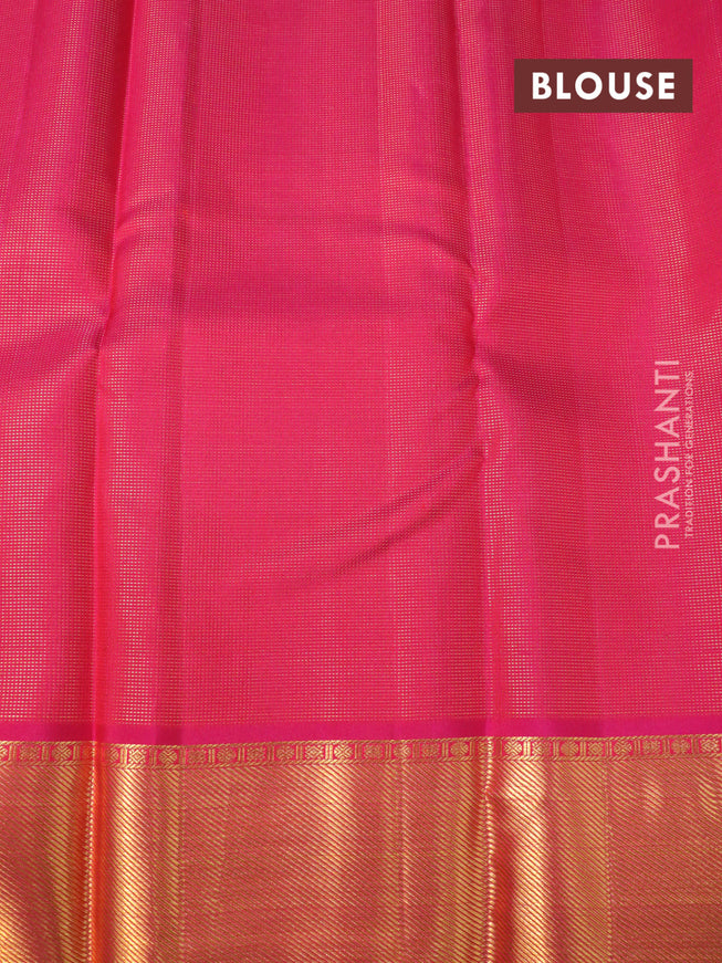 Pure kanjivaram silk saree parrot green and pink with allover zari weaves & buttas and rich zari woven border allover weaves
