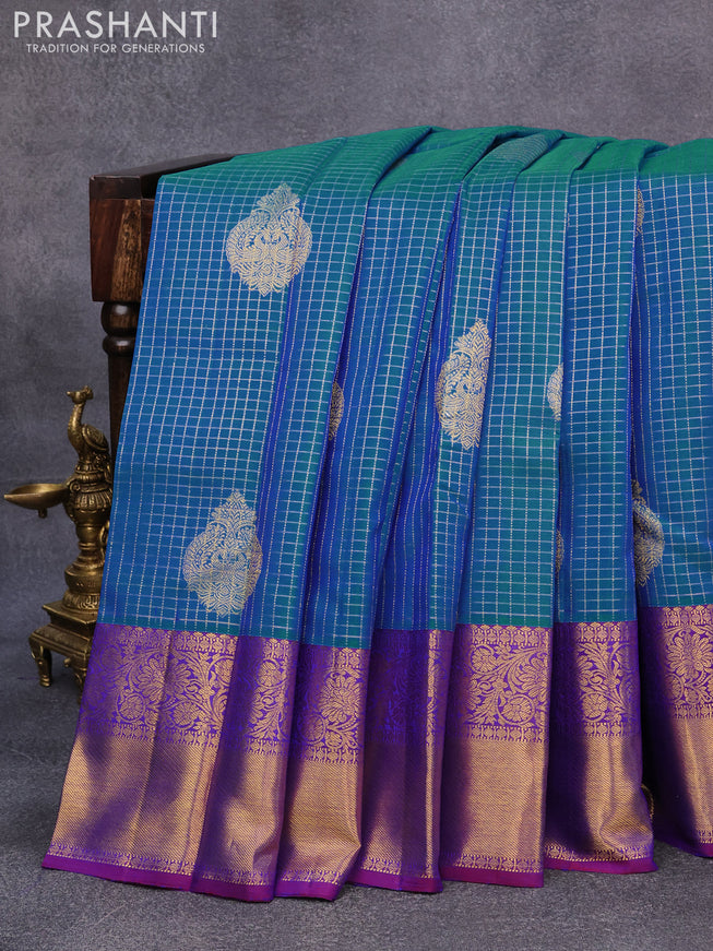 Pure kanjivaram silk saree dual shade of blue and dual shade of purple with allover zari checks & buttas and rich floral zari woven border checks