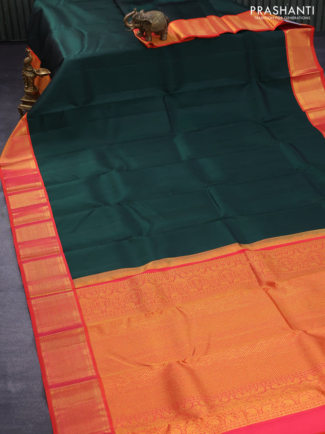 Pure kanjivaram silk saree bottle green and orange with plain body and rich zari woven border plain body