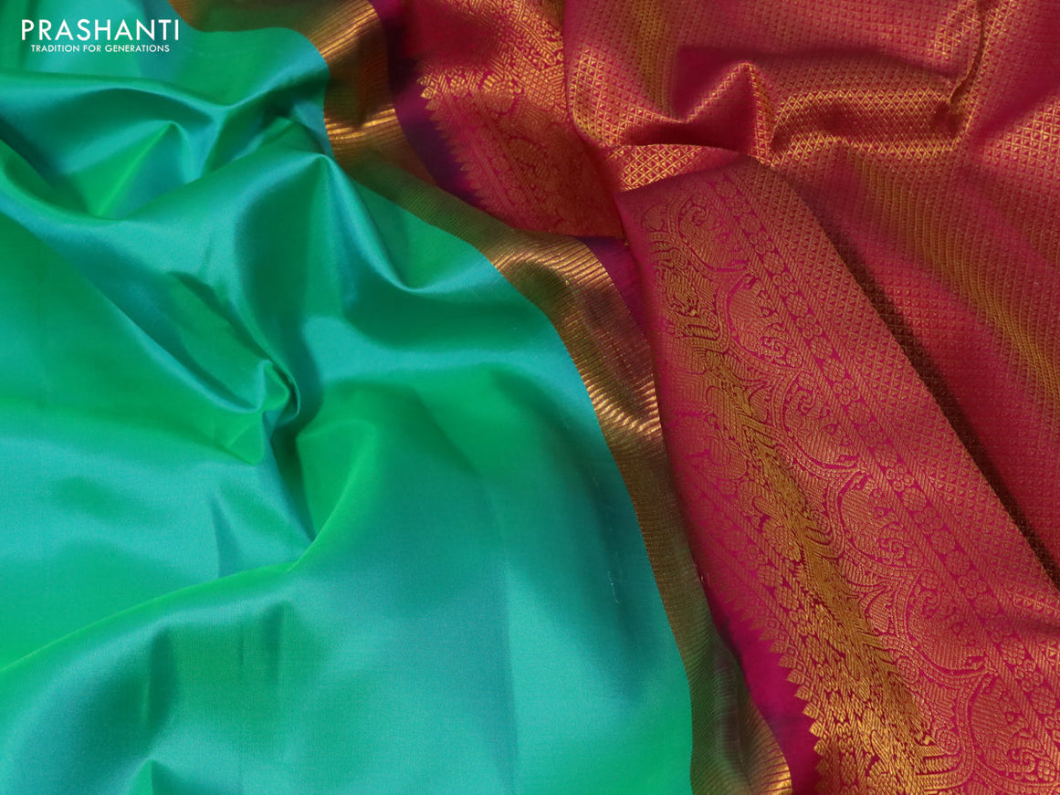 Pure kanjivaram silk saree teal green and pink with plain body and rich zari woven border plain body