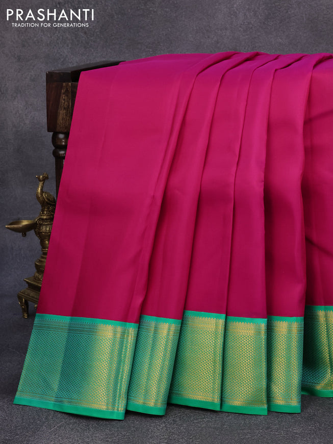 Pure kanjivaram silk saree pink and teal green with plain body and rich zari woven border plain body