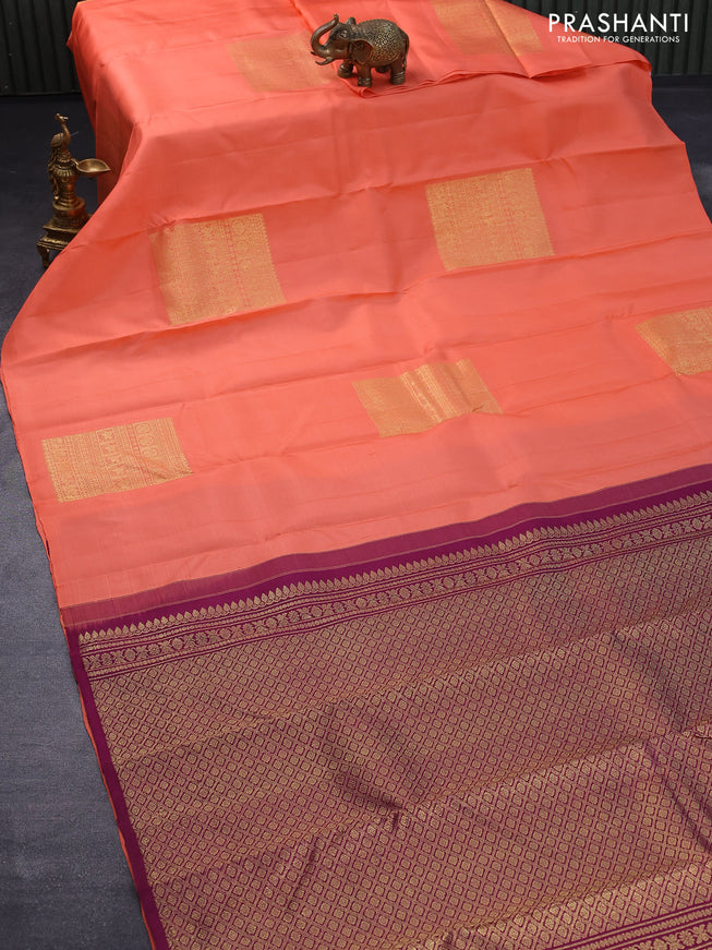 Pure kanjivaram silk saree peach orange and wine shade with box type zari woven buttas in borderless style butta style