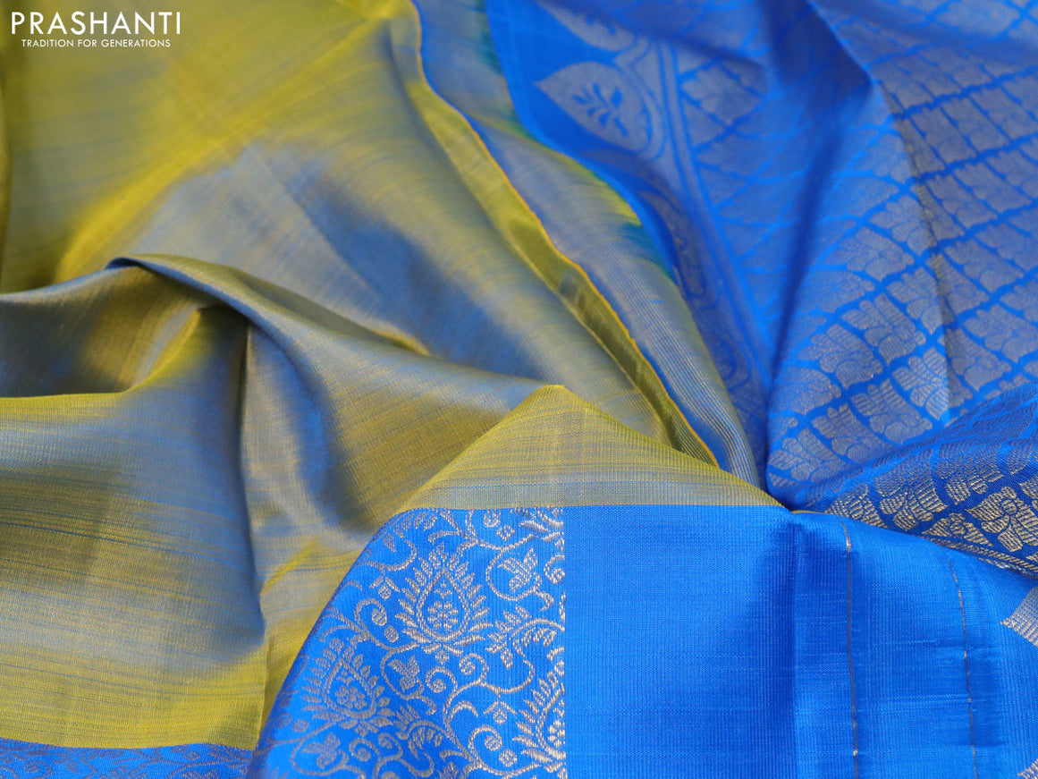Pure kanjivaram silk saree dual shade of bluish yellow and blue with half & half style and long zari woven border half & half style
