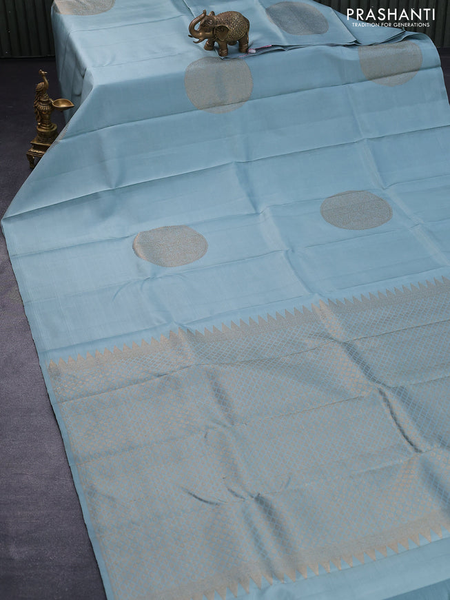 Pure kanjivaram silk saree pastel blue shade with zari woven buttas in borderless style borderless style