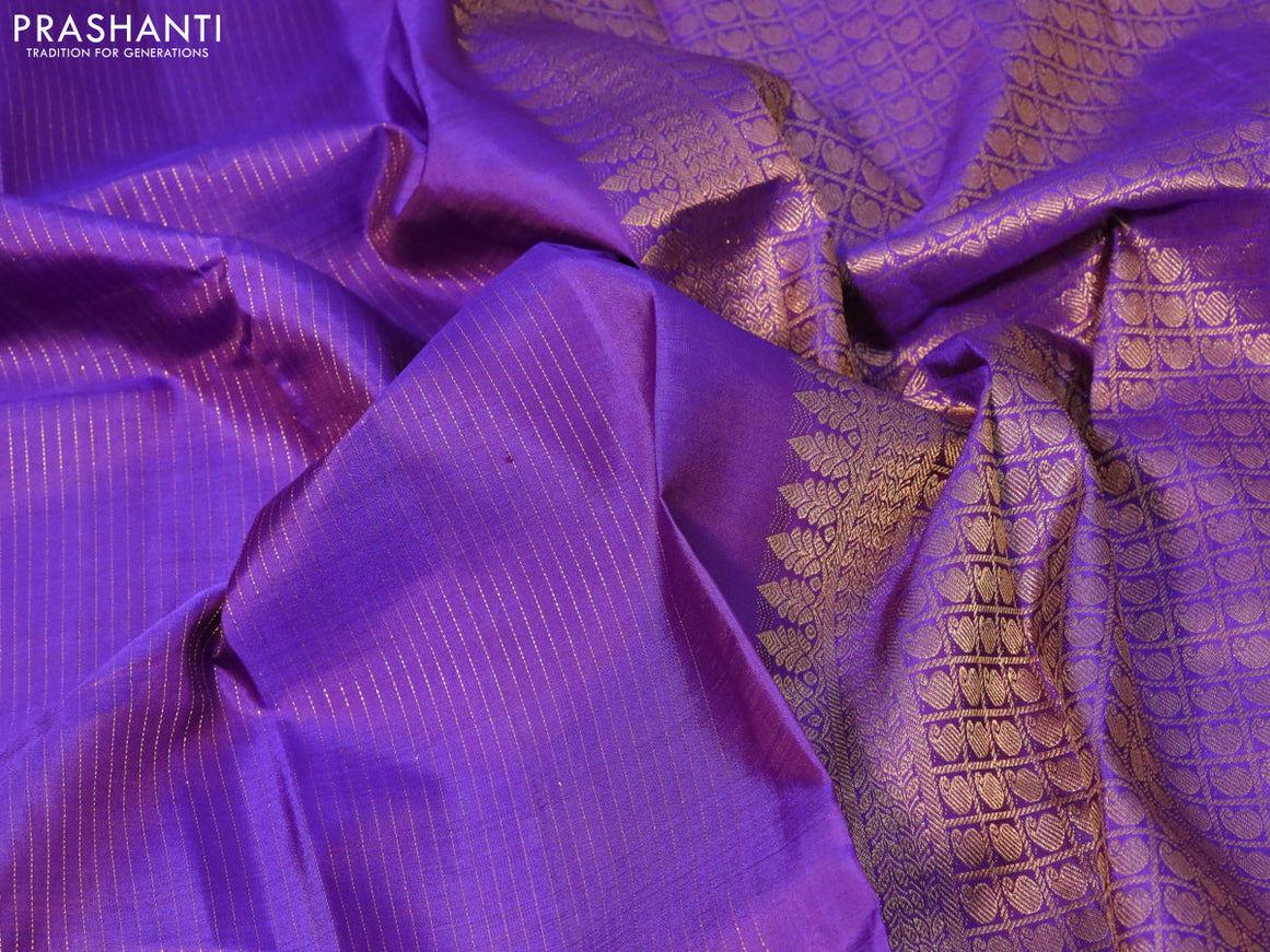 Pure kanjivaram silk saree dual shade of purple with allover zari stripe weaves and zari woven butta border allover weaves