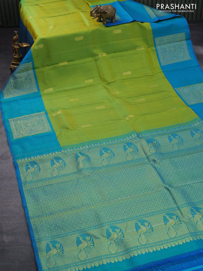 Pure kanjivaram silk saree dual shade of mustard green and dual shade of blue with zari woven buttas and long zari woven butta border butta style