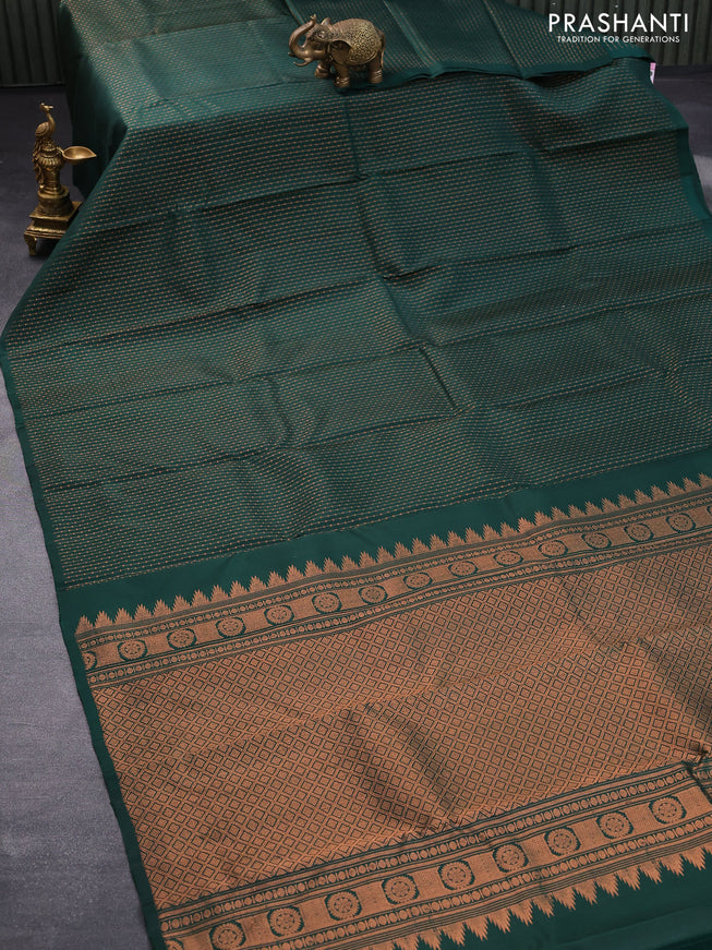 Pure kanjivaram silk saree bottle green with allover copper zari weaves in borderless style borderless style