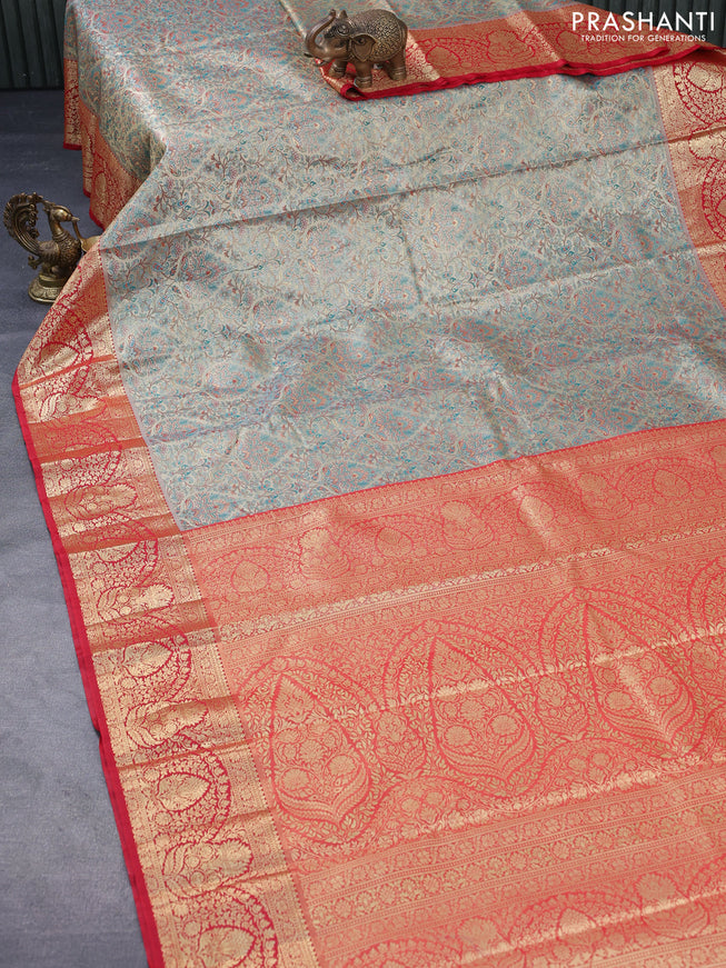 Tissue semi kanjivaram saree beige teal green and red with allover brocade weaves and zari woven border