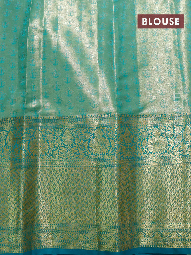 Tissue semi kanjivaram saree yellow and teal blue with allover brocade weaves and long zari woven border