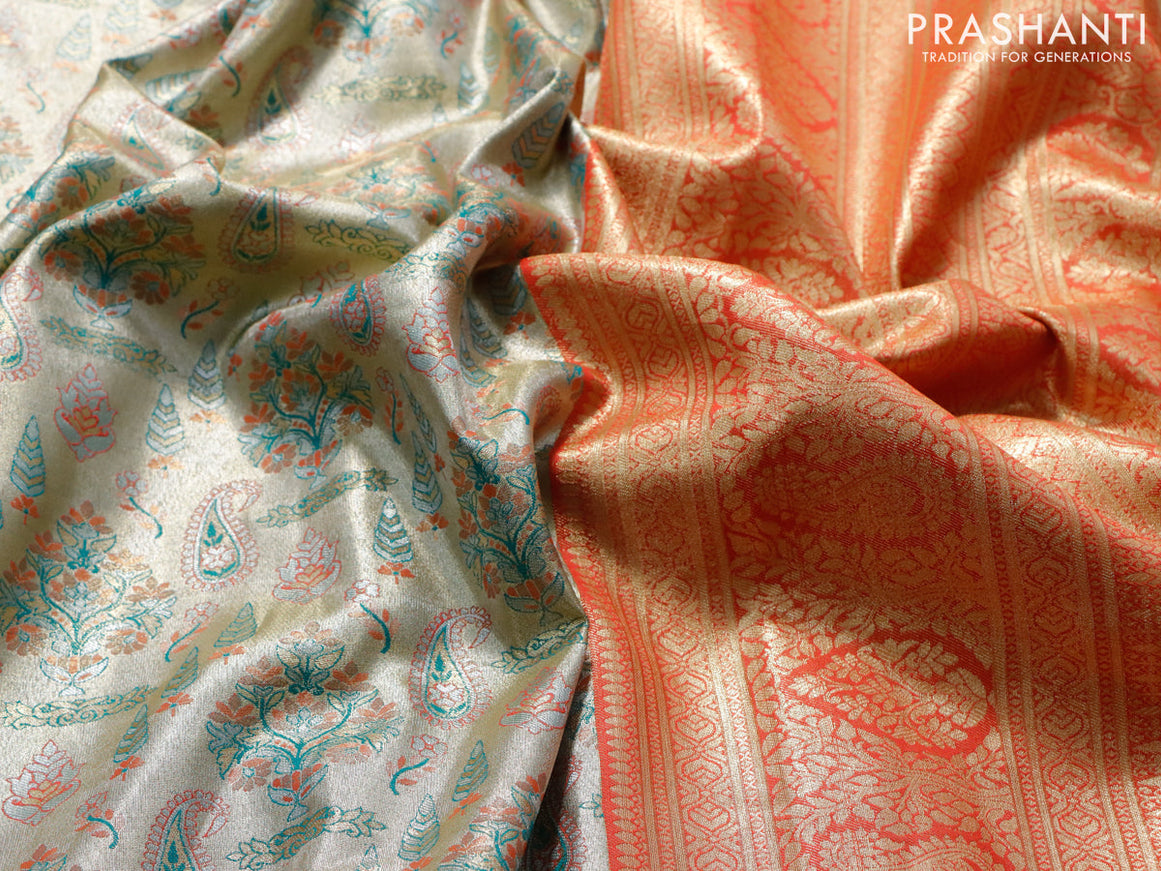 Tissue semi kanjivaram saree beige teal green and pink with allover brocade weaves and zari woven border