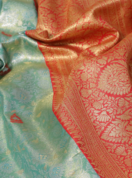 Tissue semi kanjivaram saree teal green and pink with allover brocade weaves and zari woven border