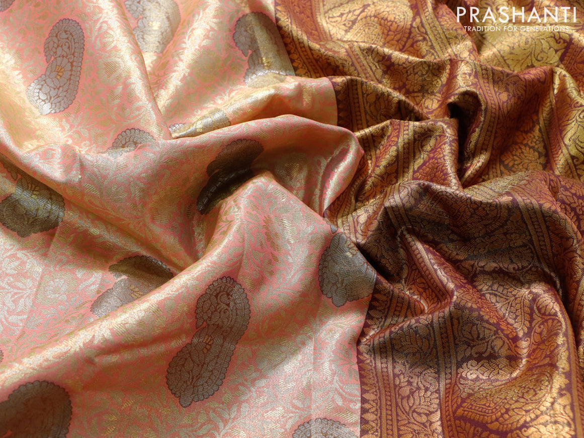 Tissue semi kanjivaram saree peach pink and purple with allover brocade weaves and copper zari woven border