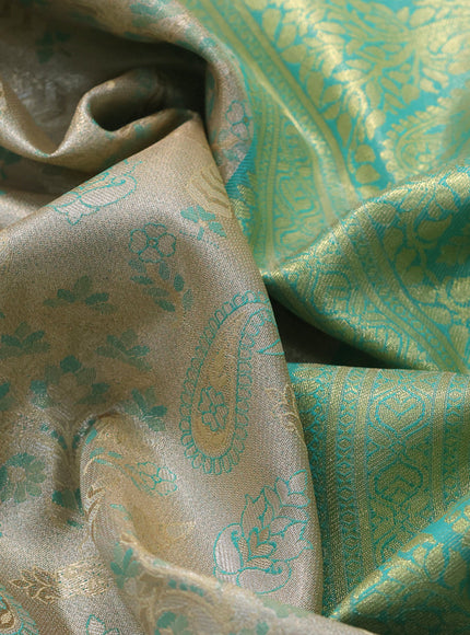 Tissue semi kanjivaram saree beige and teal blue with allover brocade weaves and zari woven border