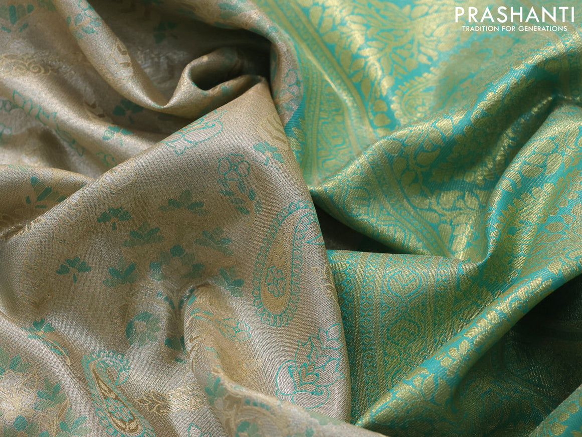 Tissue semi kanjivaram saree beige and teal blue with allover brocade weaves and zari woven border