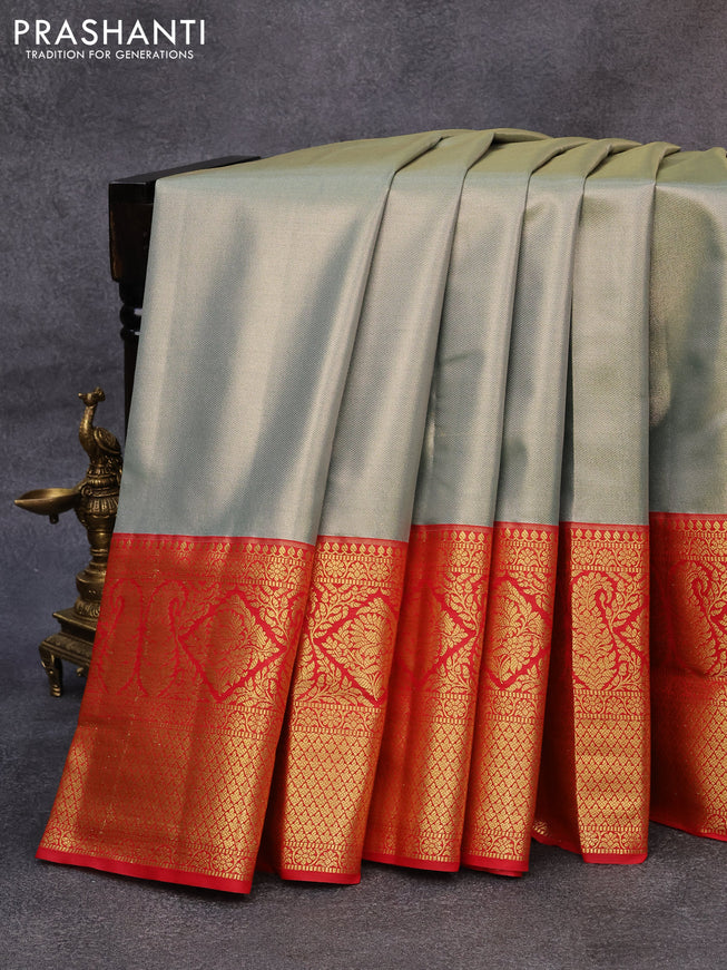 Tissue semi kanjivaram saree pastel blue and red with plain body and long zari woven border