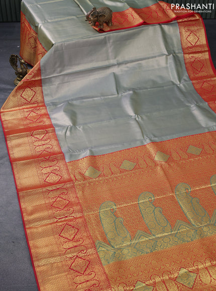 Tissue semi kanjivaram saree pastel blue and red with plain body and long zari woven border