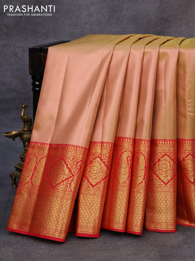 Tissue semi kanjivaram saree peach shade and red with plain body and long zari woven border