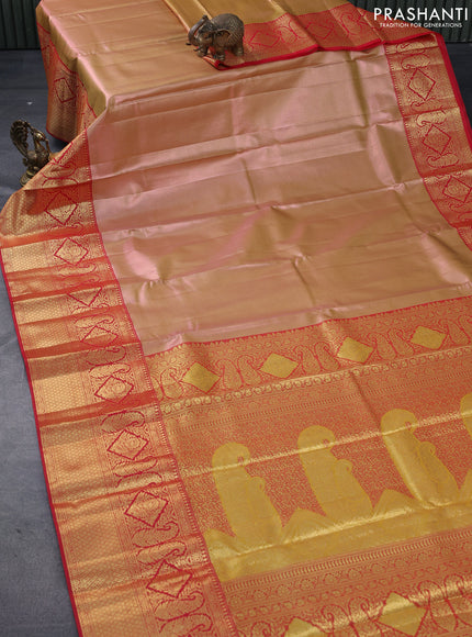 Tissue semi kanjivaram saree peach shade and red with plain body and long zari woven border