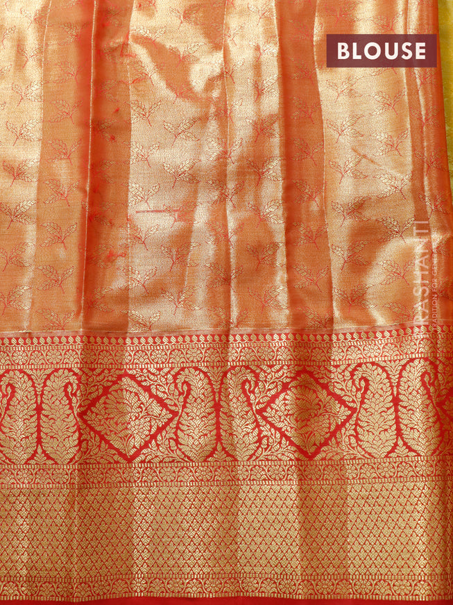 Tissue semi kanjivaram saree peach shade and red with plain body and long zari woven border