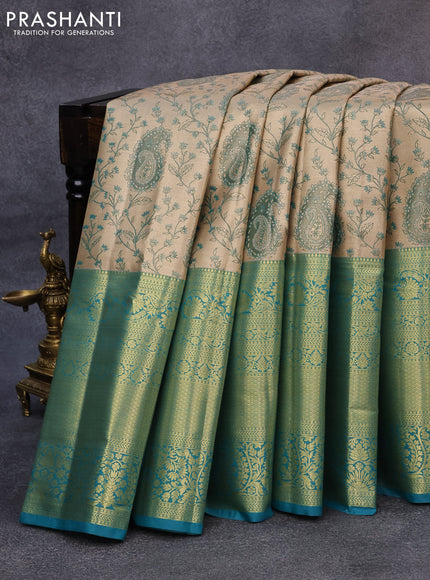 Tissue semi kanjivaram saree gold and teal blue with allover brocade weaves and long zari woven border