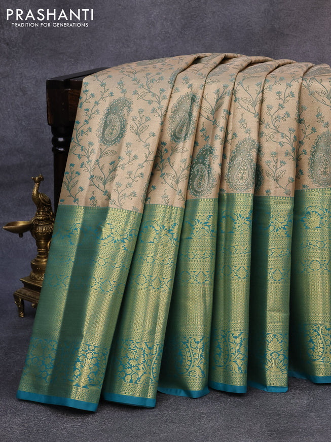 Tissue semi kanjivaram saree gold and teal blue with allover brocade weaves and long zari woven border