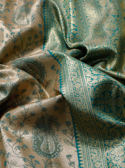 Tissue semi kanjivaram saree gold and teal blue with allover brocade weaves and long zari woven border