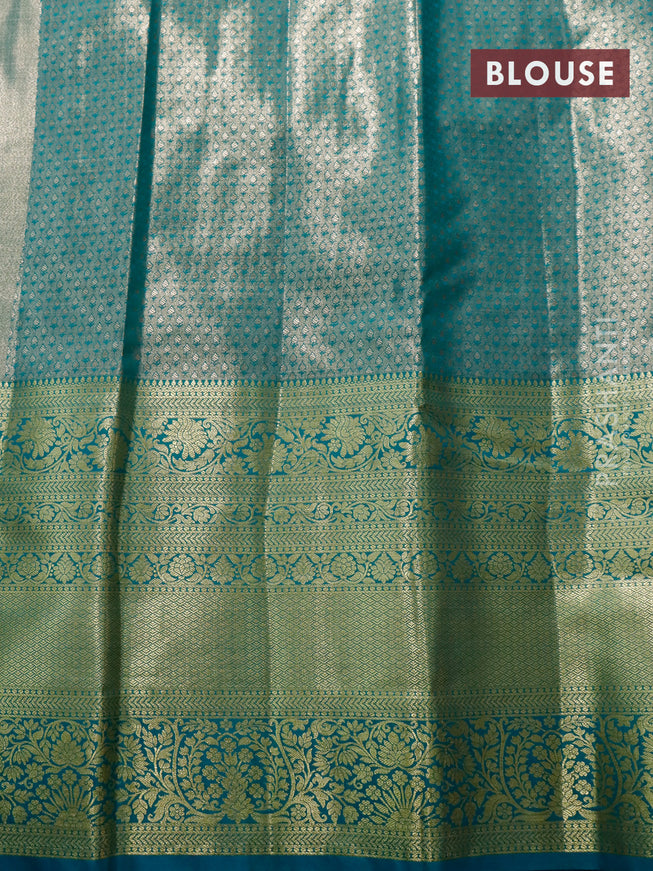 Tissue semi kanjivaram saree gold and teal blue with allover brocade weaves and long zari woven border