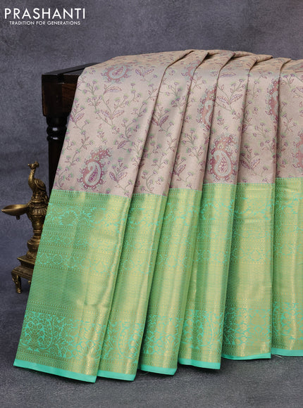 Tissue semi kanjivaram saree beige and light green with allover brocade weaves and long zari woven border