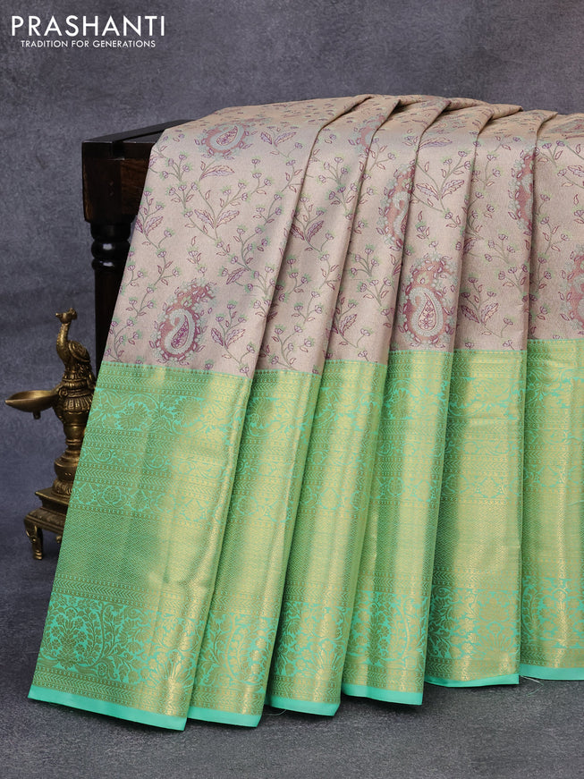 Tissue semi kanjivaram saree beige and light green with allover brocade weaves and long zari woven border