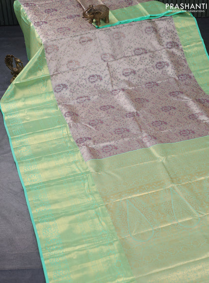 Tissue semi kanjivaram saree beige and light green with allover brocade weaves and long zari woven border