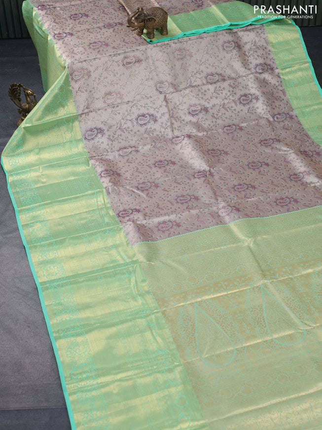 Tissue semi kanjivaram saree beige and light green with allover brocade weaves and long zari woven border