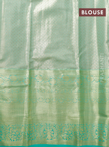 Tissue semi kanjivaram saree beige and light green with allover brocade weaves and long zari woven border