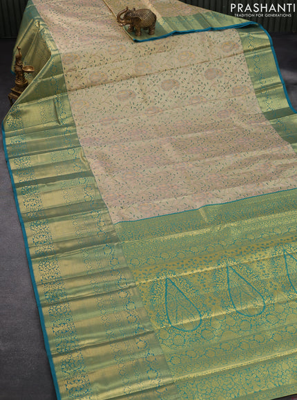 Tissue semi kanjivaram saree beige and teal blue with allover brocade weaves and long zari woven border