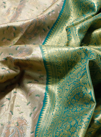 Tissue semi kanjivaram saree beige and teal blue with allover brocade weaves and long zari woven border