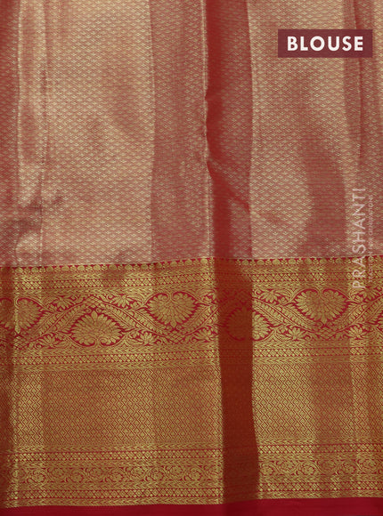 Tissue semi kanjivaram saree peach orange and pink with allover patola brocade weaves and long zari woven border