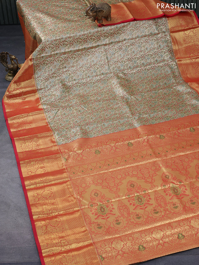 Tissue semi kanjivaram saree cream and red with allover brocade weaves and zari woven border