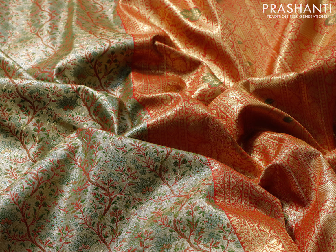 Tissue semi kanjivaram saree cream and red with allover brocade weaves and zari woven border