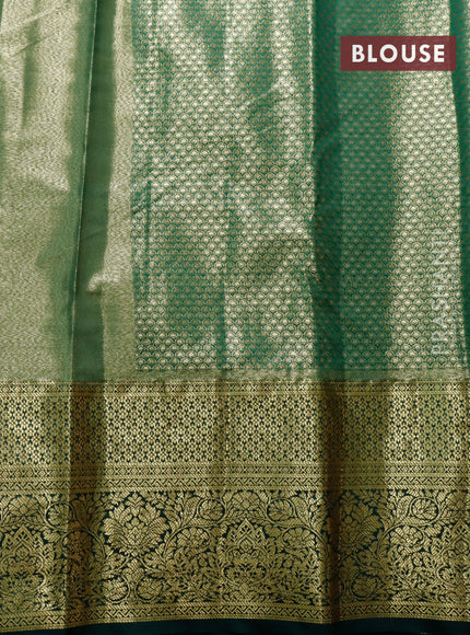 Tissue semi kanjivaram saree beige pink and dark green with allover brocade weaves and zari woven border