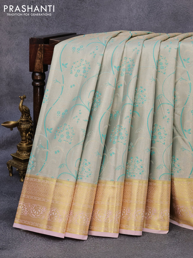 Tissue semi kanjivaram saree cream teal blue and baby pink with allover brocade weaves and zari woven border