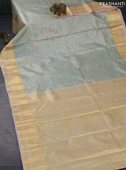 Tissue semi kanjivaram saree cream teal blue and baby pink with allover brocade weaves and zari woven border